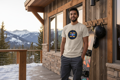 Latino male snowboarder wearing The Boards Shop T outside a Park City mountain apartment